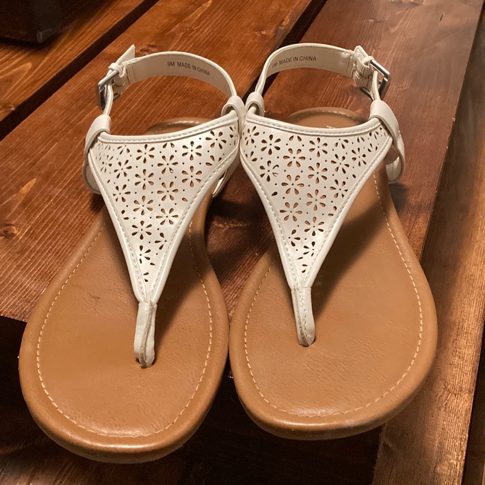 Women’s white and tan sandals